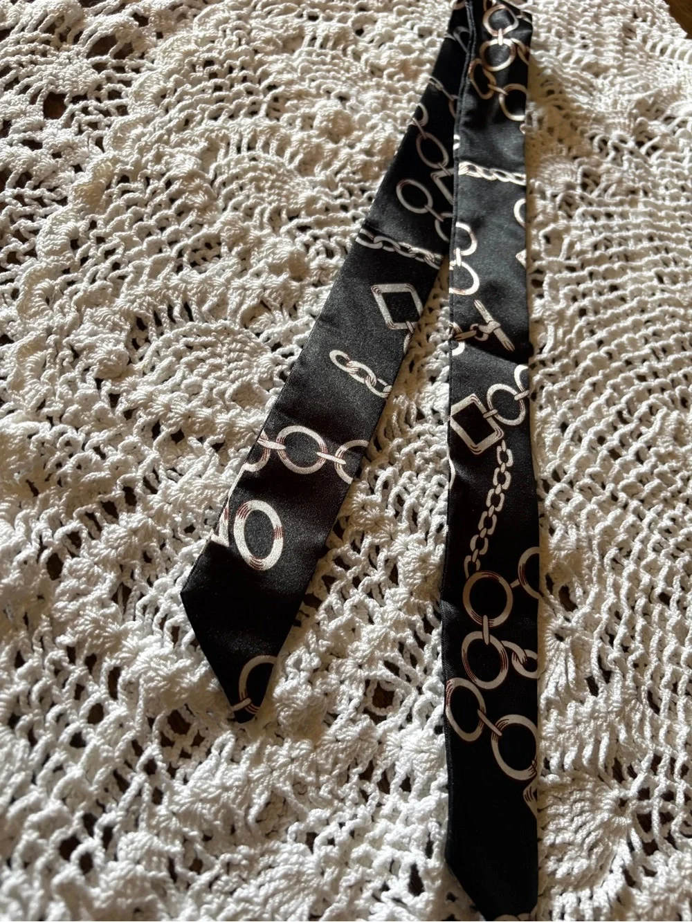 Two Unbranded Twillies in Black and Multi-Color